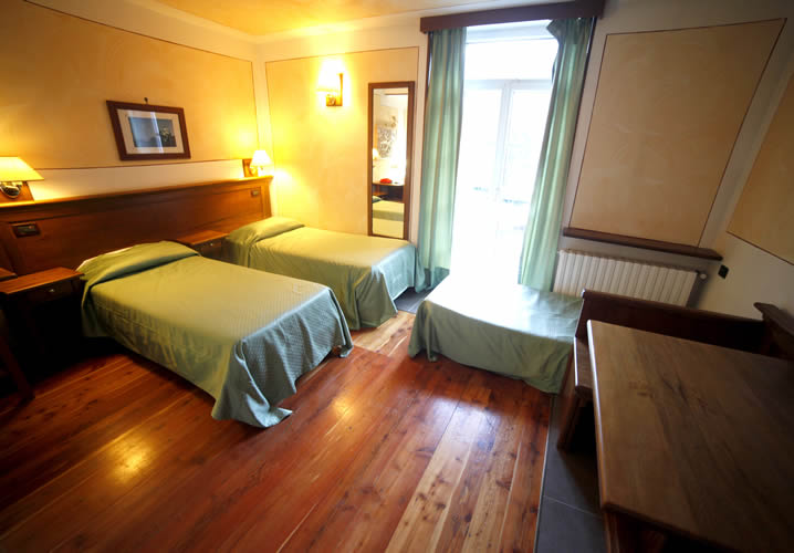 A typical bedroom in the Hotel Le Soleil
