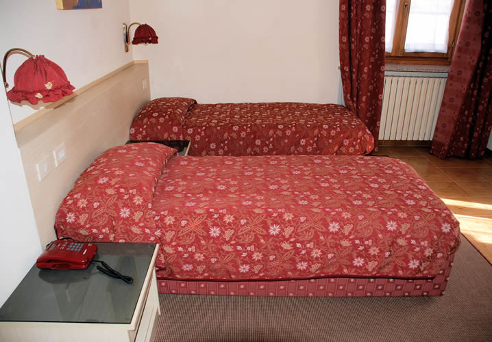 A typical bedroom within the Hotel Beau Sejour
