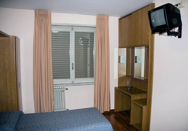 A typical bedroom in the Hotel Roma