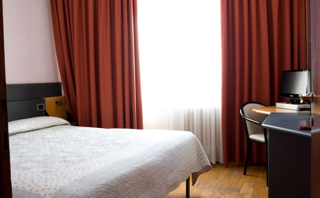 A typical double bedroom in the Hotel Turin