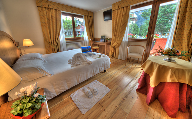 A bedroom in the Cresta et Duc