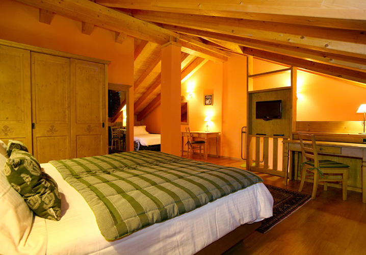A typical bedroom within the Hotel Boton D'or